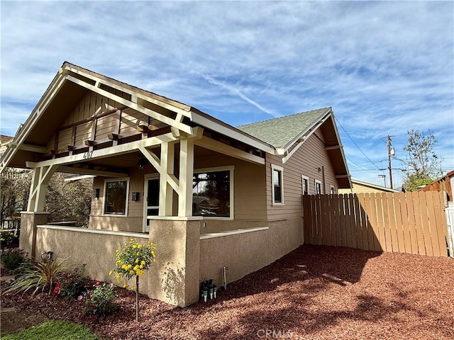 view of property exterior with a balcony