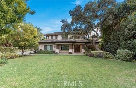view of front of property with a front lawn