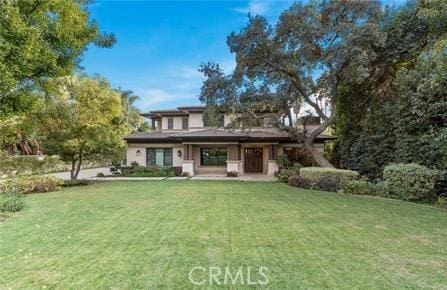 view of front of property with a front lawn