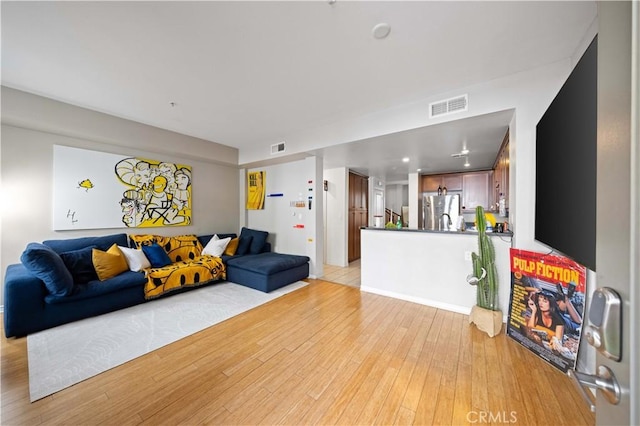 living room featuring light hardwood / wood-style flooring