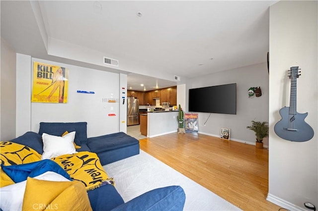 living room with light wood-type flooring