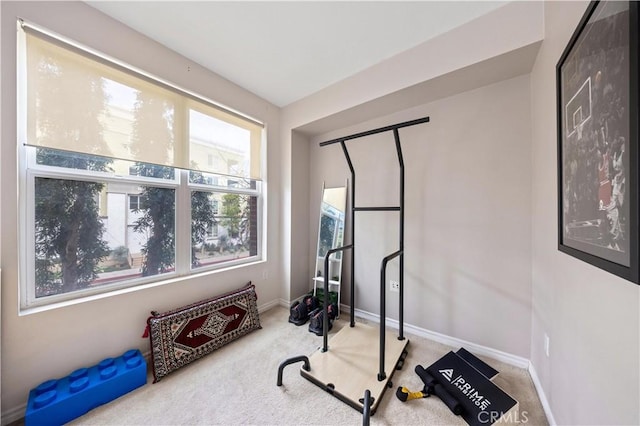 workout room with carpet flooring