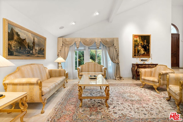 sitting room with light tile patterned flooring, beam ceiling, and high vaulted ceiling