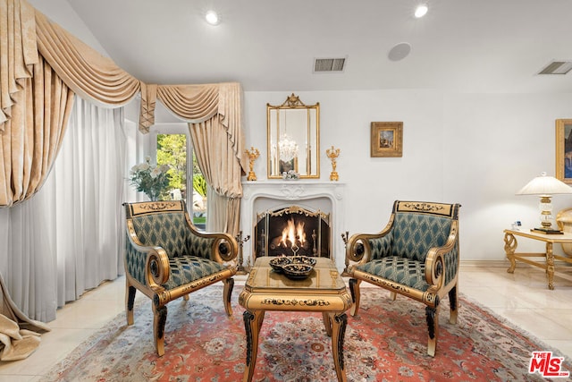 sitting room featuring light tile patterned floors