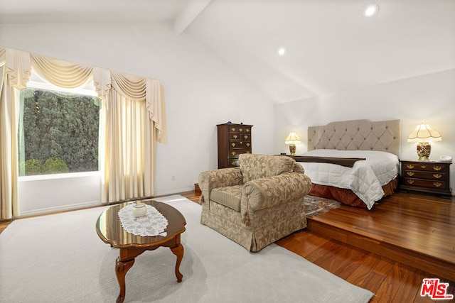 bedroom featuring lofted ceiling with beams and wood-type flooring