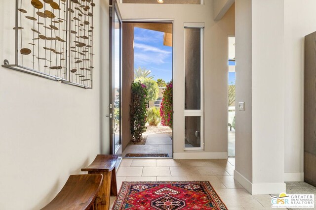 view of tiled foyer entrance