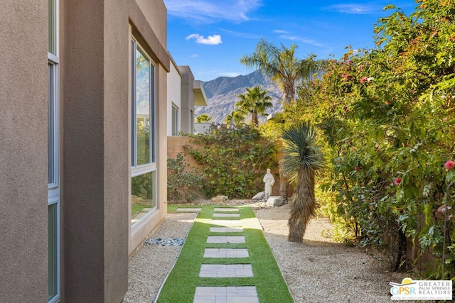 view of yard with a mountain view