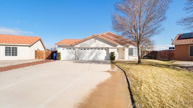 view of front facade with a garage and a front lawn