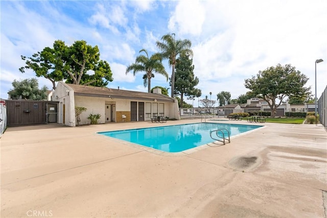 view of pool featuring a patio