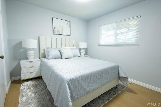 bedroom featuring hardwood / wood-style floors