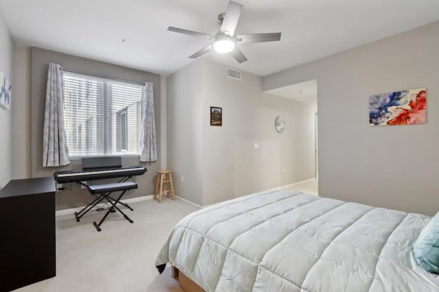 carpeted bedroom with ceiling fan