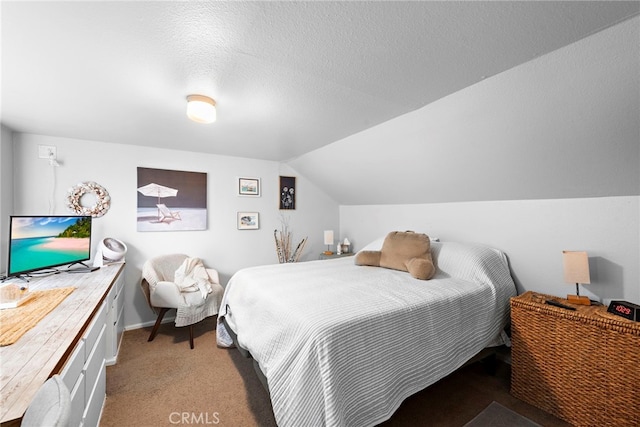 carpeted bedroom featuring lofted ceiling and a textured ceiling