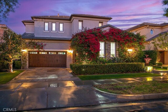 view of front of home featuring a garage