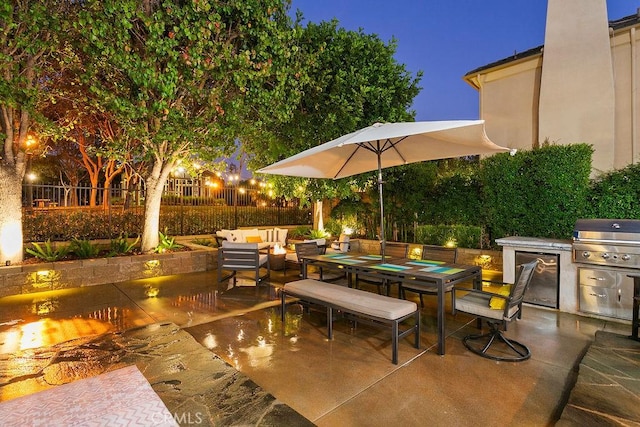 view of patio with an outdoor living space and area for grilling