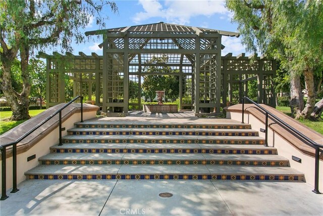 view of property's community featuring stairway