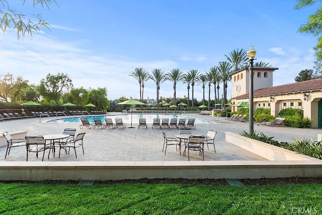 view of pool featuring a patio