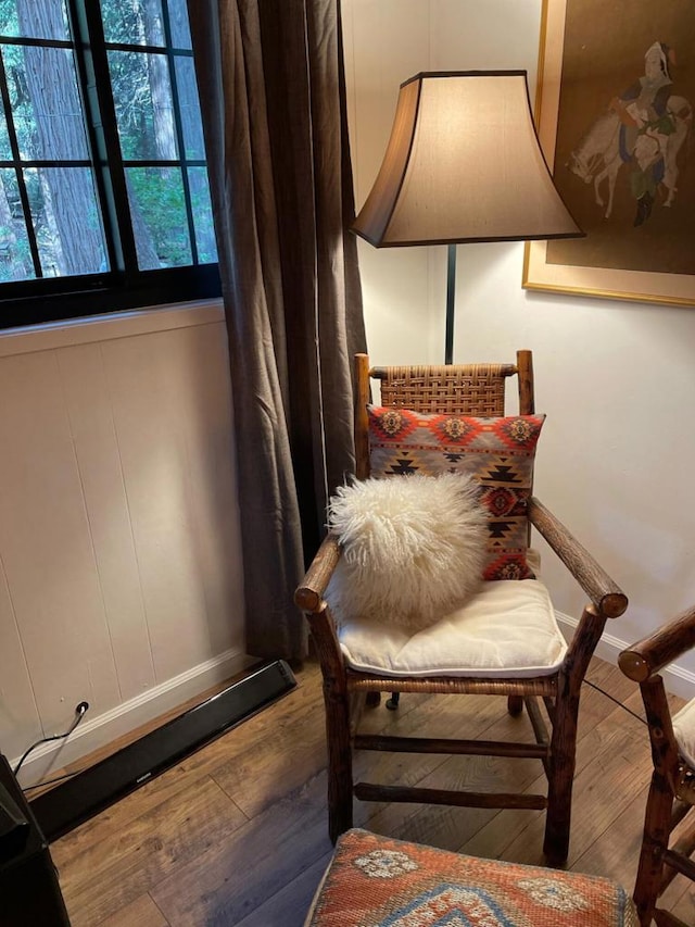 sitting room featuring hardwood / wood-style floors