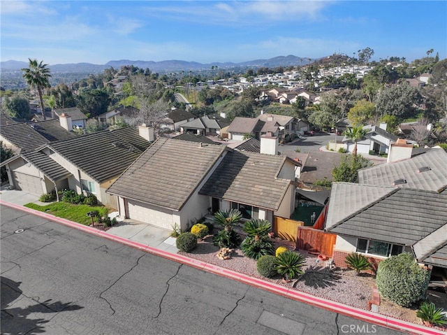 aerial view with a residential view and a mountain view