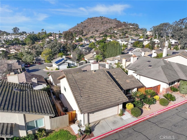 aerial view with a mountain view and a residential view