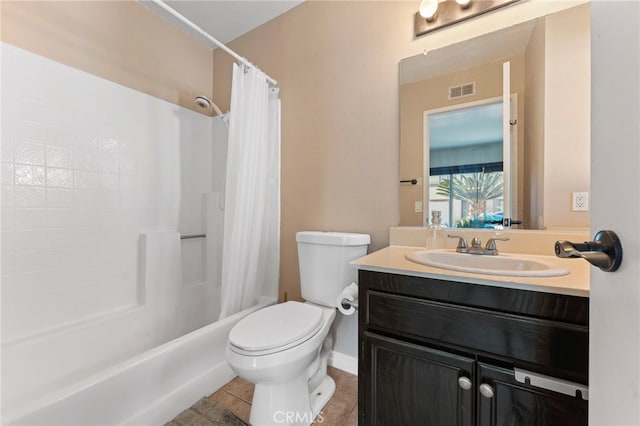 bathroom with toilet, tile patterned floors, visible vents, vanity, and shower / tub combo with curtain