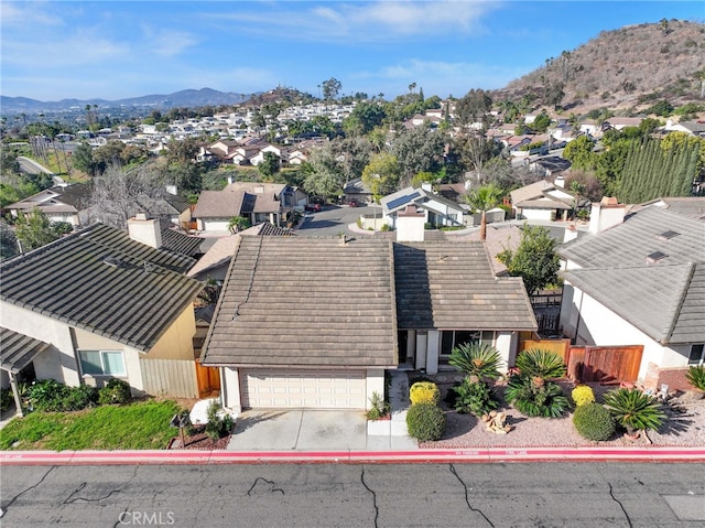 bird's eye view featuring a mountain view and a residential view