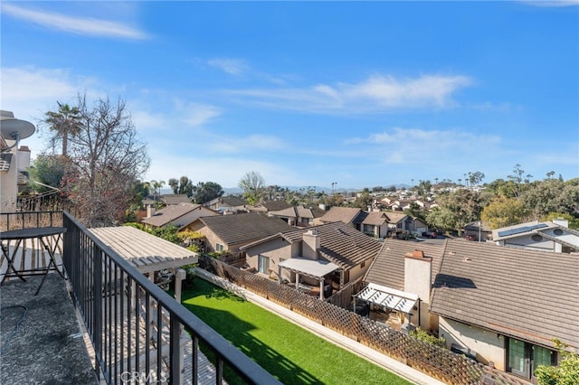 balcony featuring a residential view