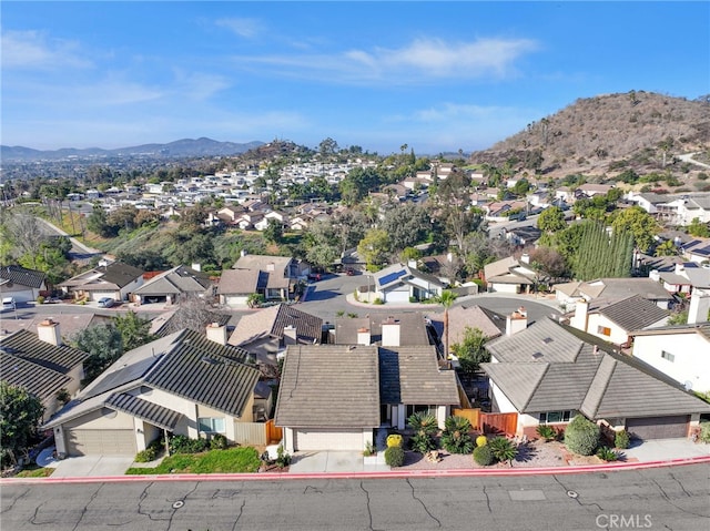 aerial view with a mountain view and a residential view