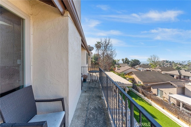 balcony featuring a residential view