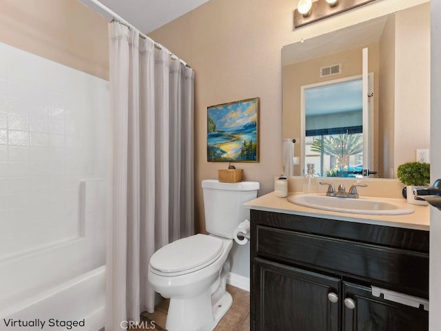 bathroom with shower / bath combo, visible vents, toilet, tile patterned flooring, and vanity