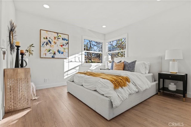 bedroom with light wood-type flooring