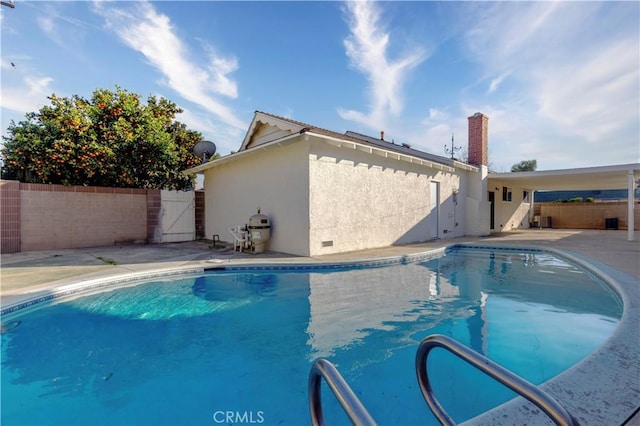 view of pool with a patio