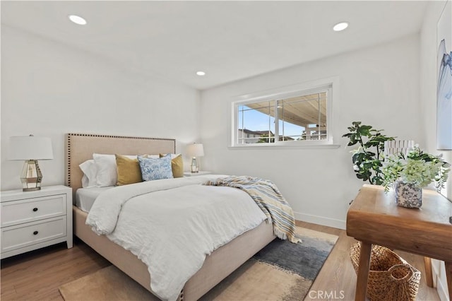 bedroom featuring light hardwood / wood-style flooring