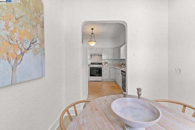 dining space featuring sink