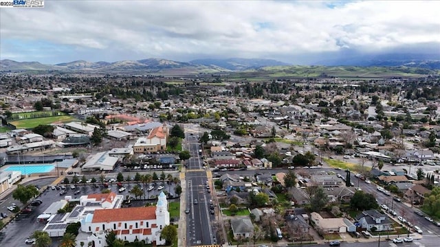 drone / aerial view featuring a mountain view