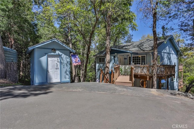 view of front of home with a deck