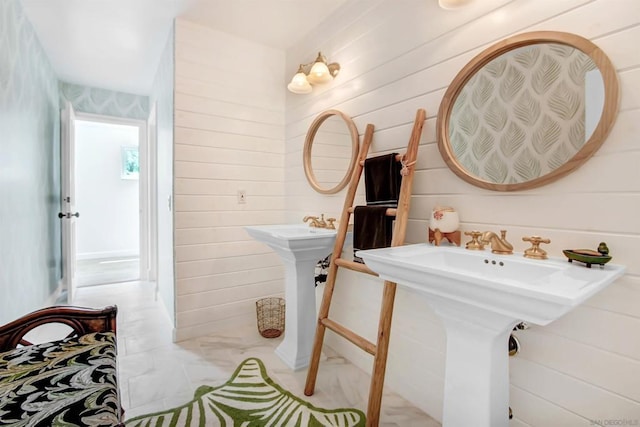 bathroom with dual sinks