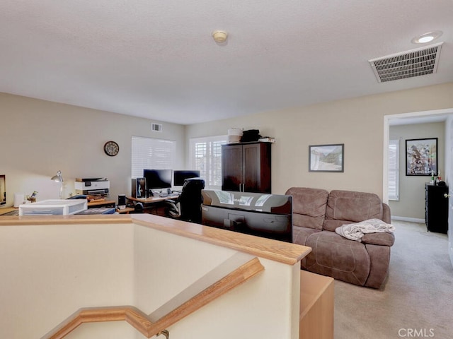 living room with light colored carpet