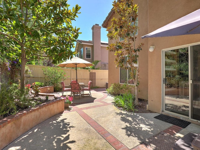 view of patio / terrace with fence and outdoor dining space