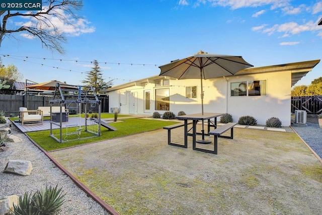 view of home's community featuring a lawn