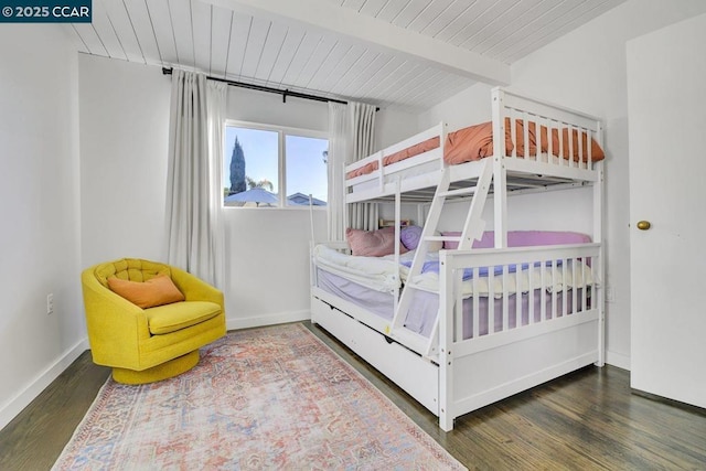 bedroom with hardwood / wood-style flooring, wood ceiling, and beamed ceiling