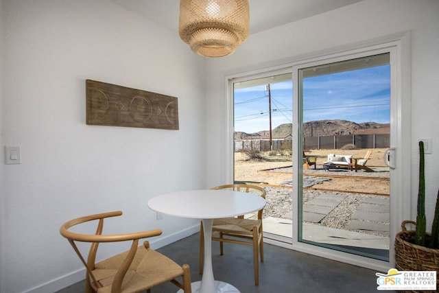 dining space featuring a mountain view