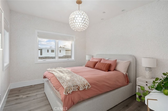 bedroom with light wood-type flooring