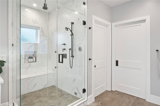 bathroom featuring an enclosed shower