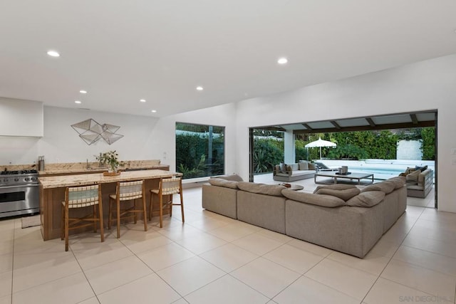 living room with light tile patterned flooring