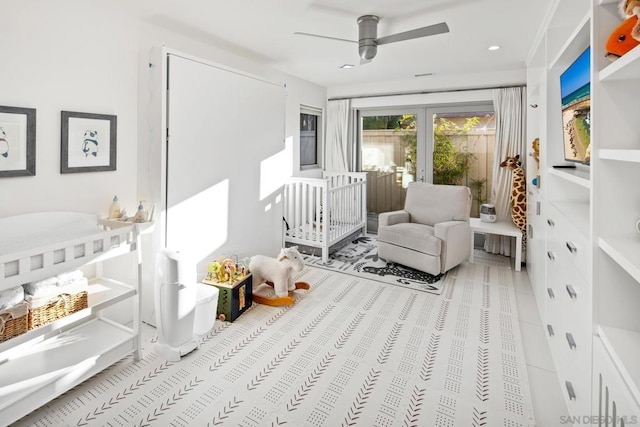 bedroom with light tile patterned flooring and ceiling fan