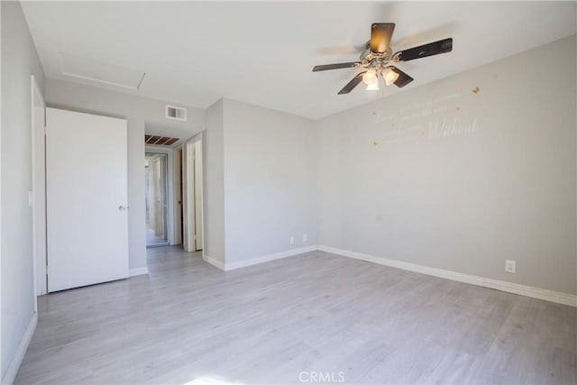 unfurnished room with light hardwood / wood-style floors and ceiling fan