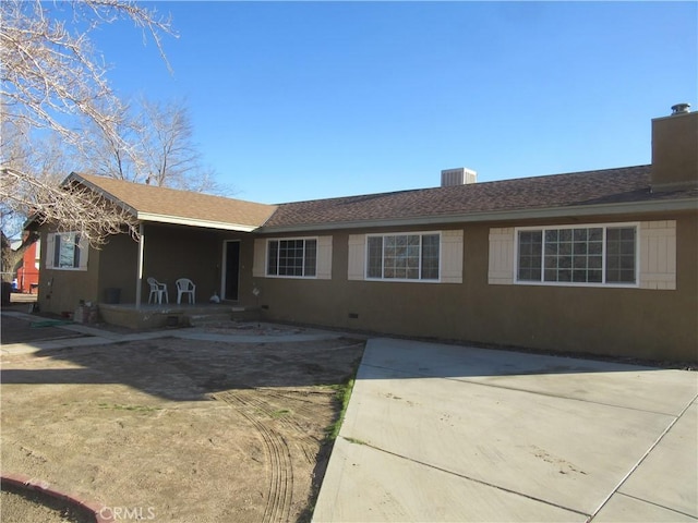 single story home featuring a patio