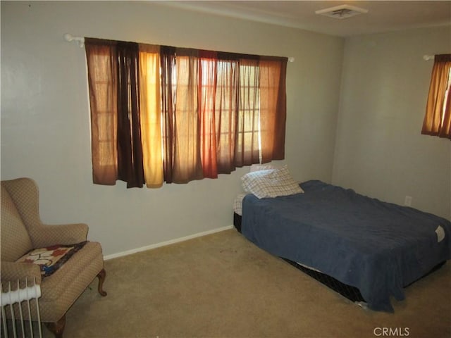 bedroom with light carpet