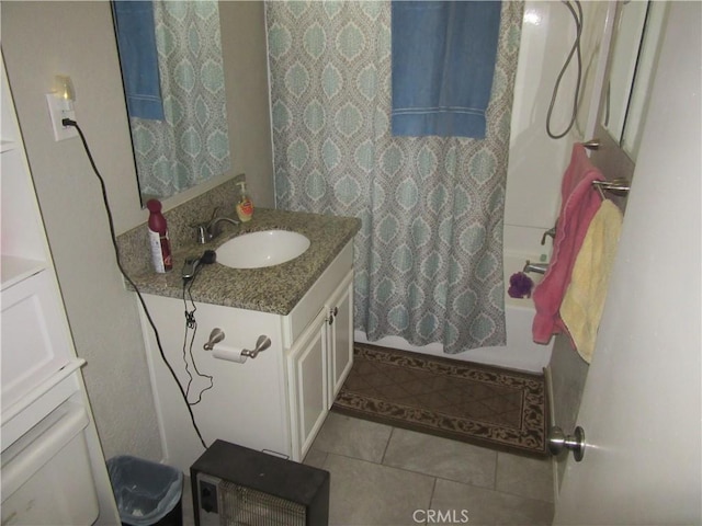 full bathroom featuring toilet, vanity, shower / bathtub combination with curtain, and tile patterned flooring