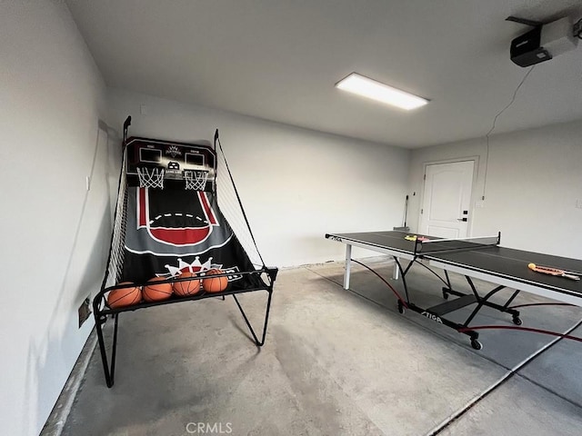 game room with concrete floors